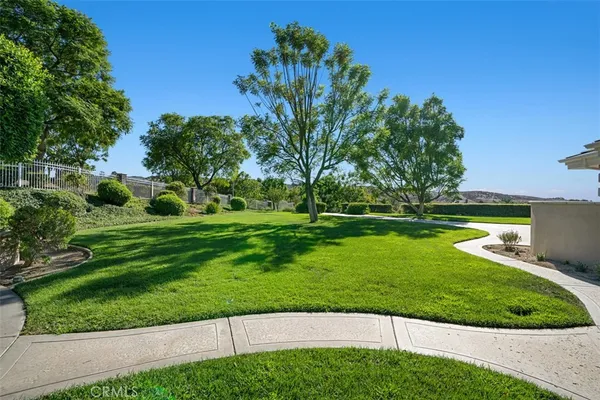 a view of a golf course with a lake