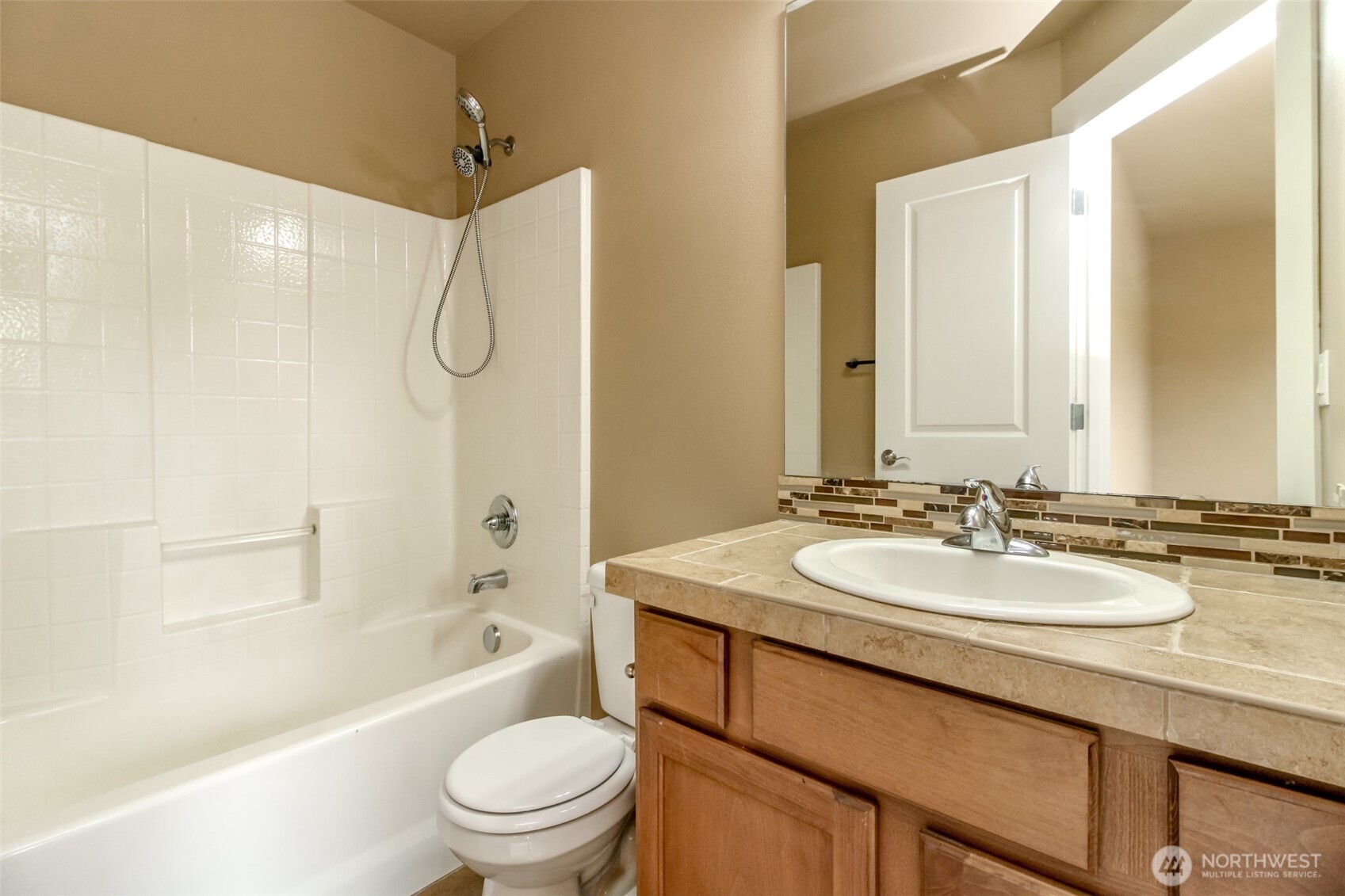 3000 South Mt Baker Boulevard Seattle, WA 98144 - Photo 27 of 40 a bathroom with a sink a toilet and a bathtub