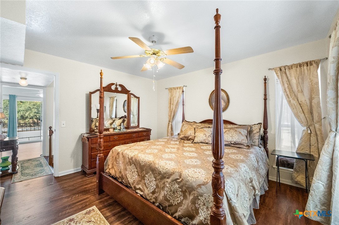 619 Strings Drive, Unit 619 San Antonio, TX 78216 - Photo 22 of 48 a bedroom with bed and window