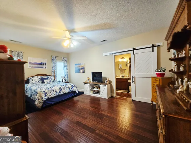 a view of a bathroom with a shower curtain