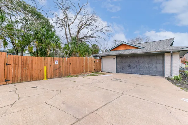 a front view of a house with a garage