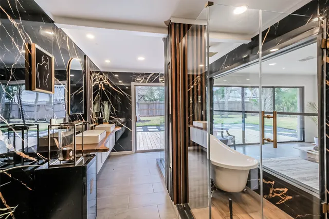 a view of a balcony with chairs