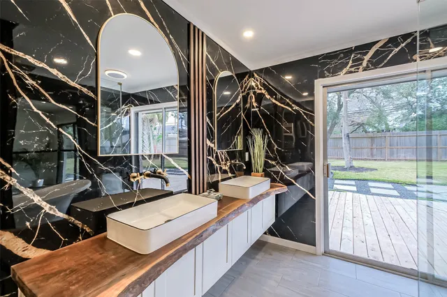 a view of gym equipment and floor to ceiling window