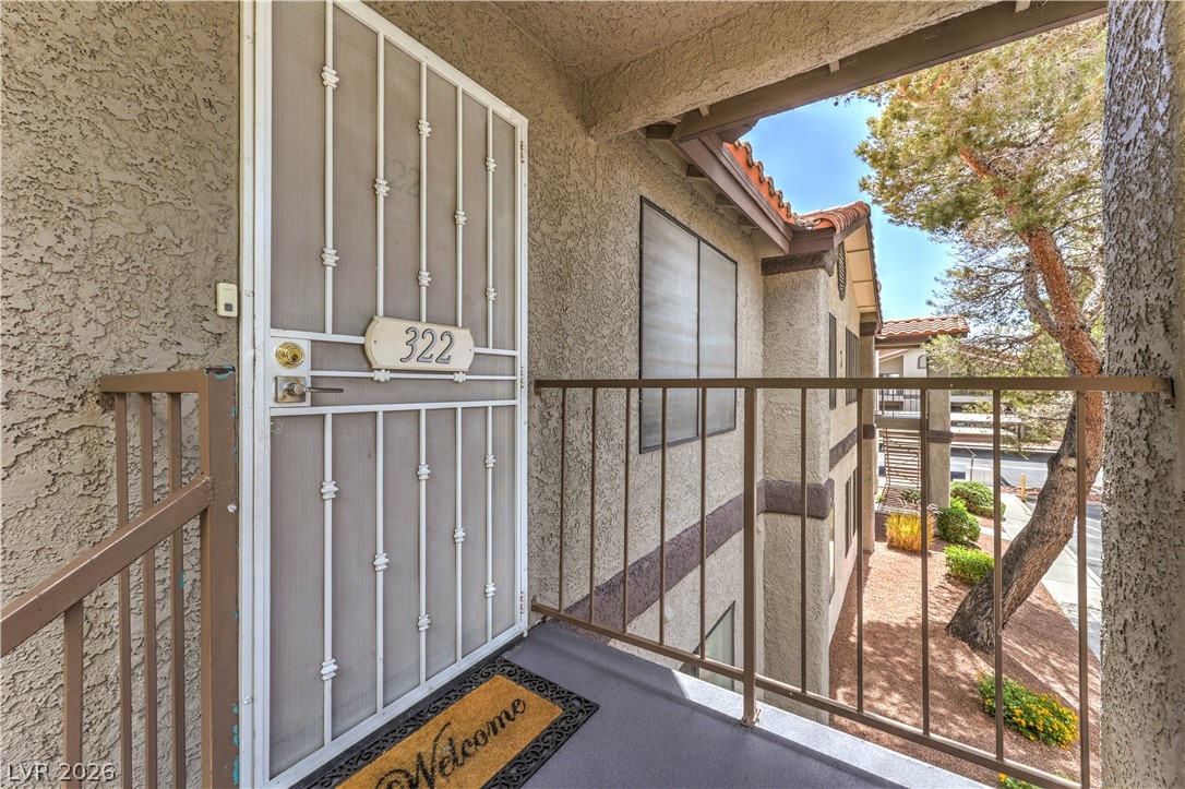 1575 West Warm Springs Road, Unit 322 Henderson, NV 89014 - Photo 4 of 25 Enter this inviting residence offering a private and elevated perspective.