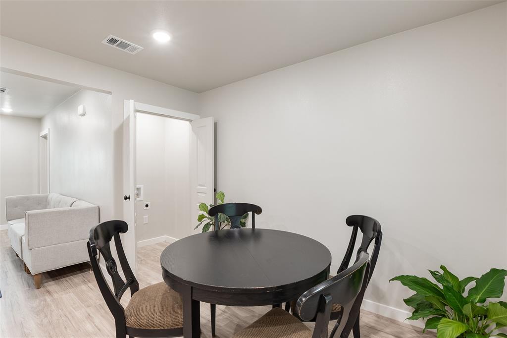 3110 Utah Avenue Dallas, TX 75216 - Photo 11 of 26 a dining room with furniture and a potted plant