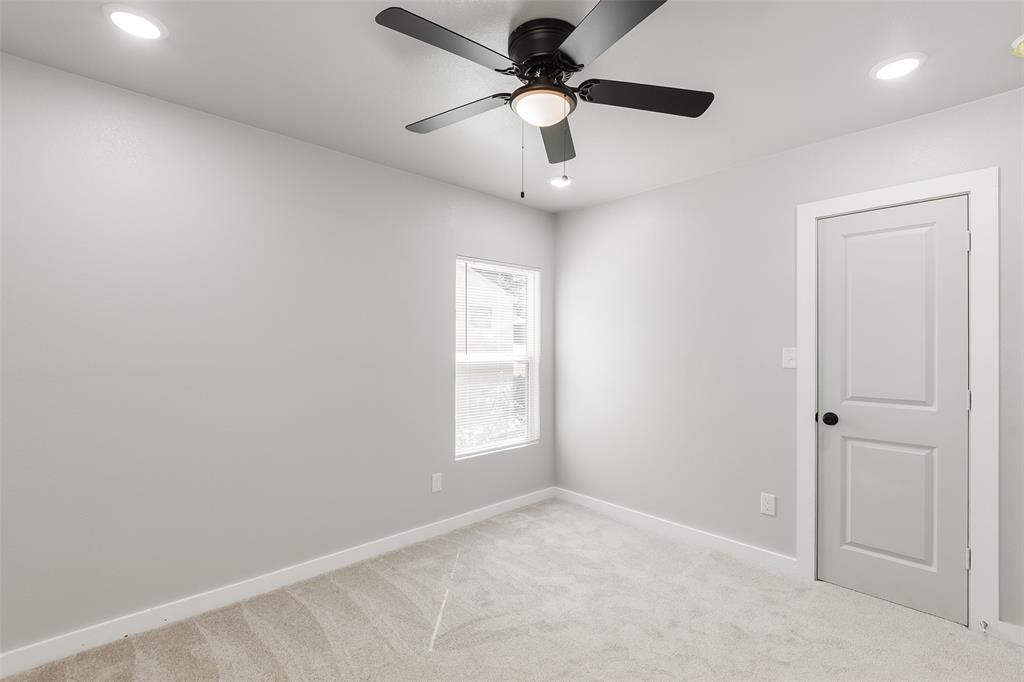 3110 Utah Avenue Dallas, TX 75216 - Photo 20 of 26 an empty room with a window and a fan