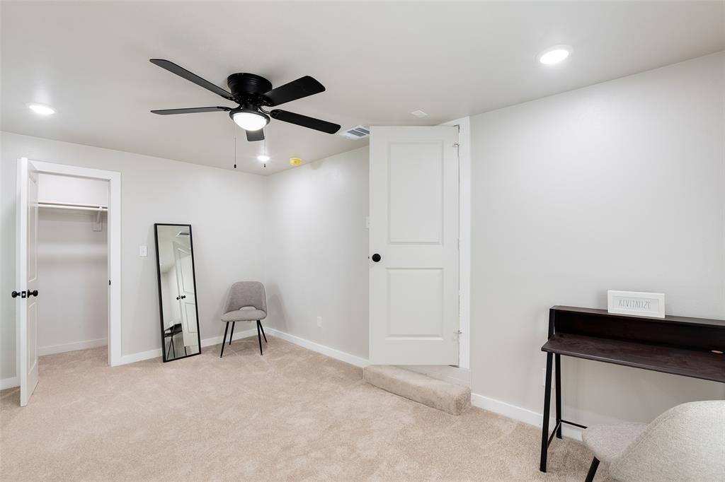 3110 Utah Avenue Dallas, TX 75216 - Photo 21 of 26 a view of a livingroom with furniture and a ceiling fan