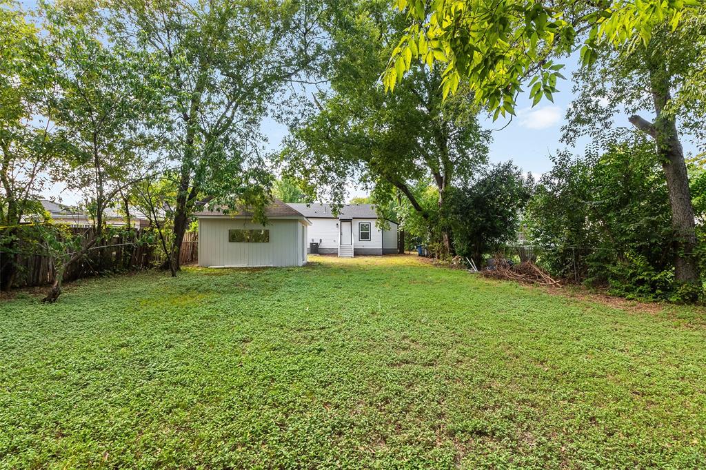 3110 Utah Avenue Dallas, TX 75216 - Photo 25 of 26 a front view of a house with a garden