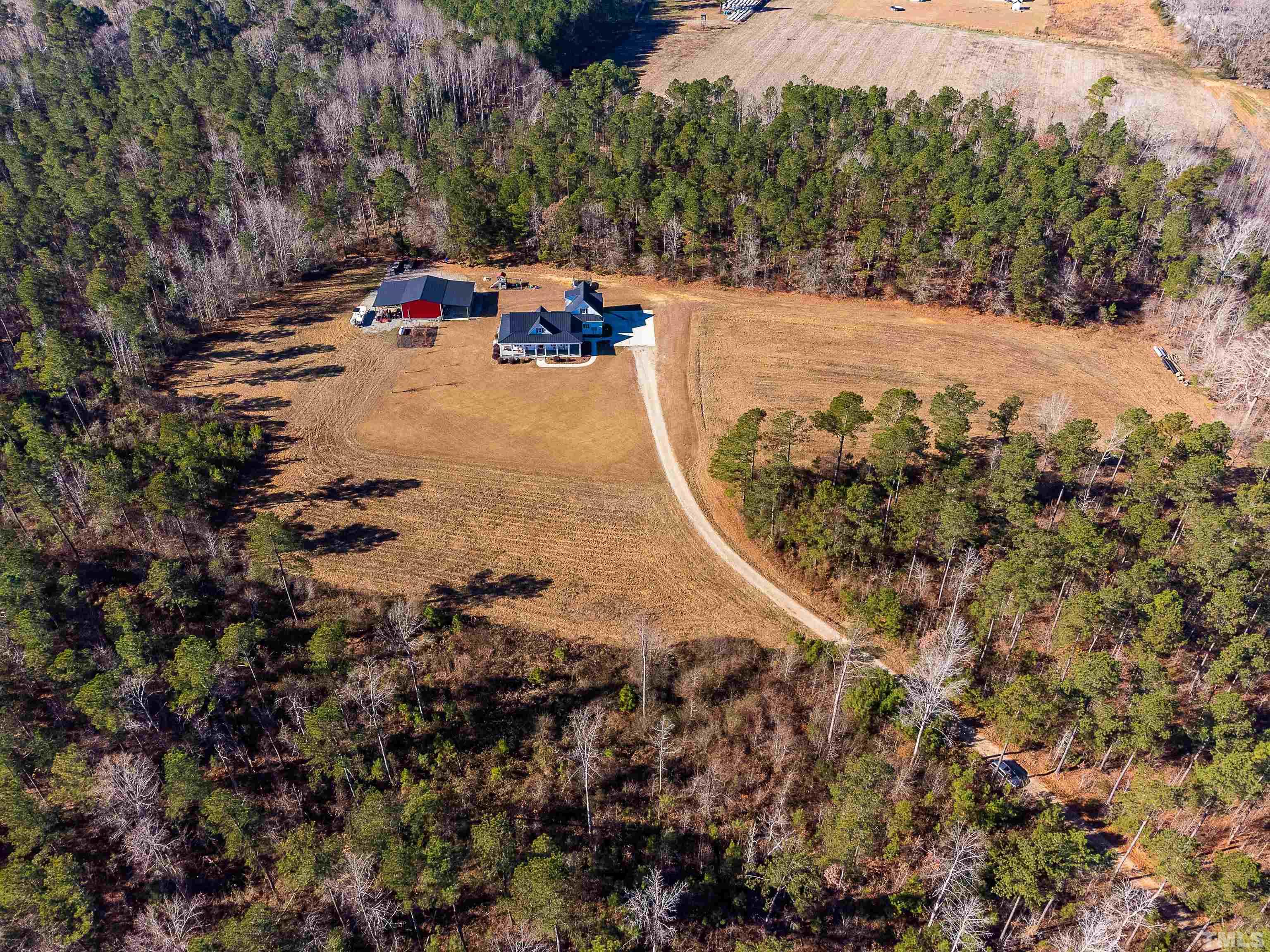 4300 Debnam Road Zebulon, NC 27597 - Photo 12 of 54 a view of swimming pool with a yard