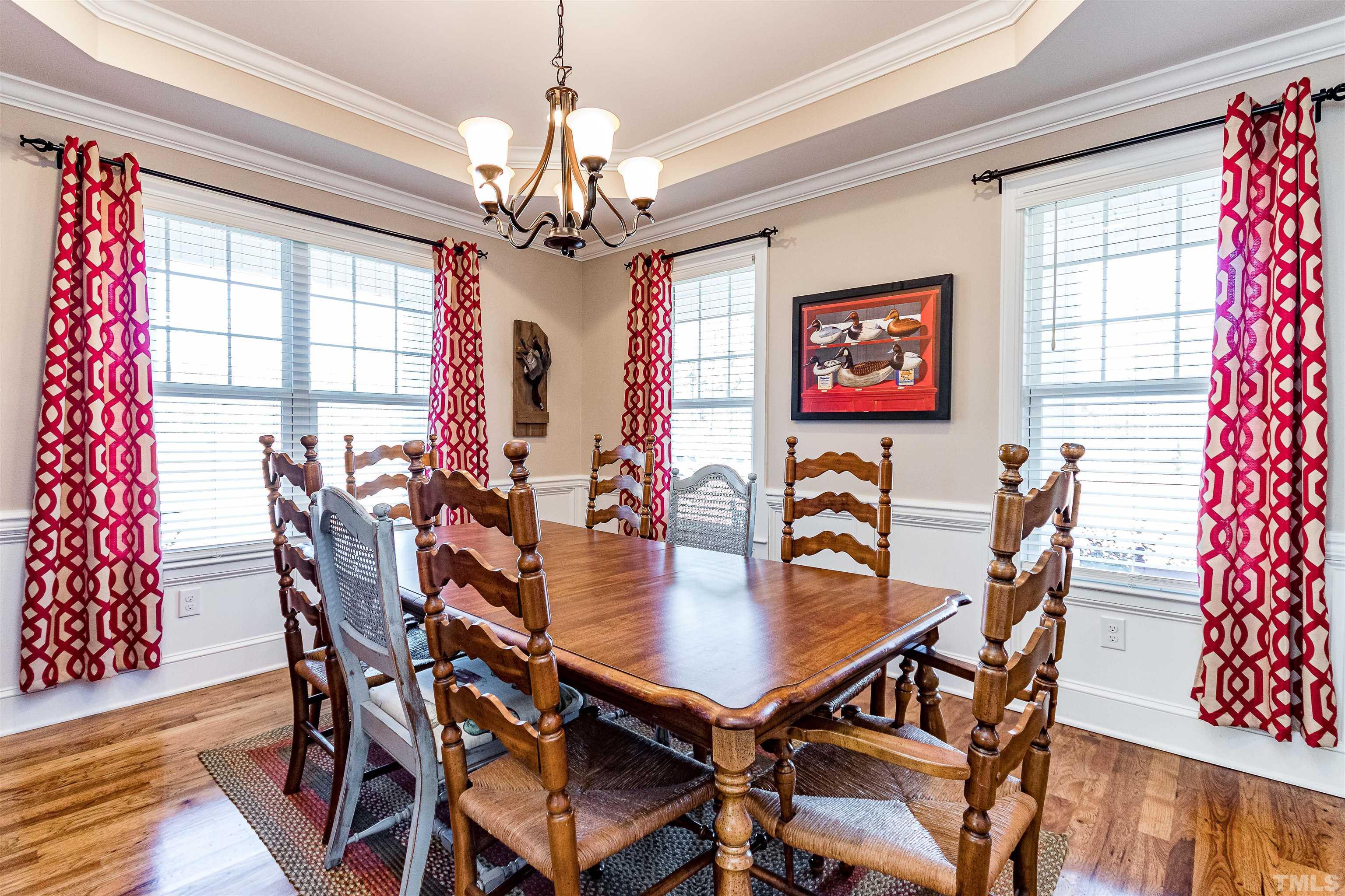 4300 Debnam Road Zebulon, NC 27597 - Photo 33 of 54 a view of a dining room with furniture window and wooden floor