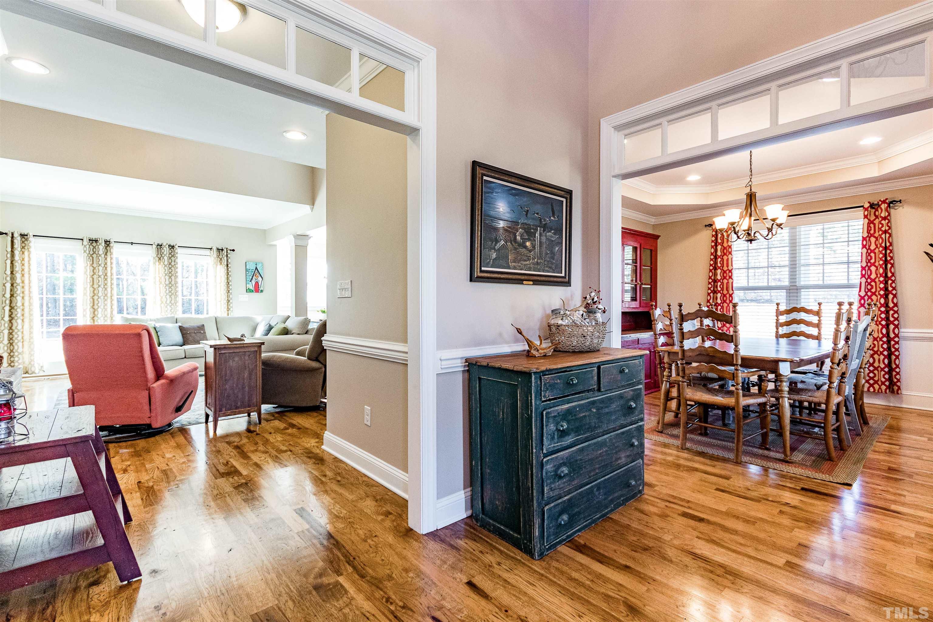 4300 Debnam Road Zebulon, NC 27597 - Photo 36 of 54 a view of a dining room with furniture window and wooden floor