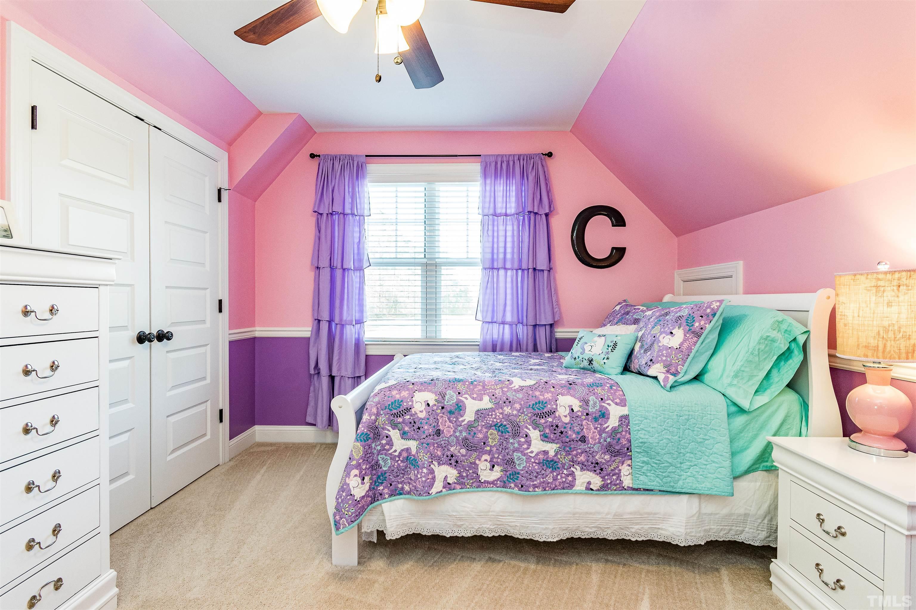 4300 Debnam Road Zebulon, NC 27597 - Photo 49 of 54 a bedroom with a bed and a dresser