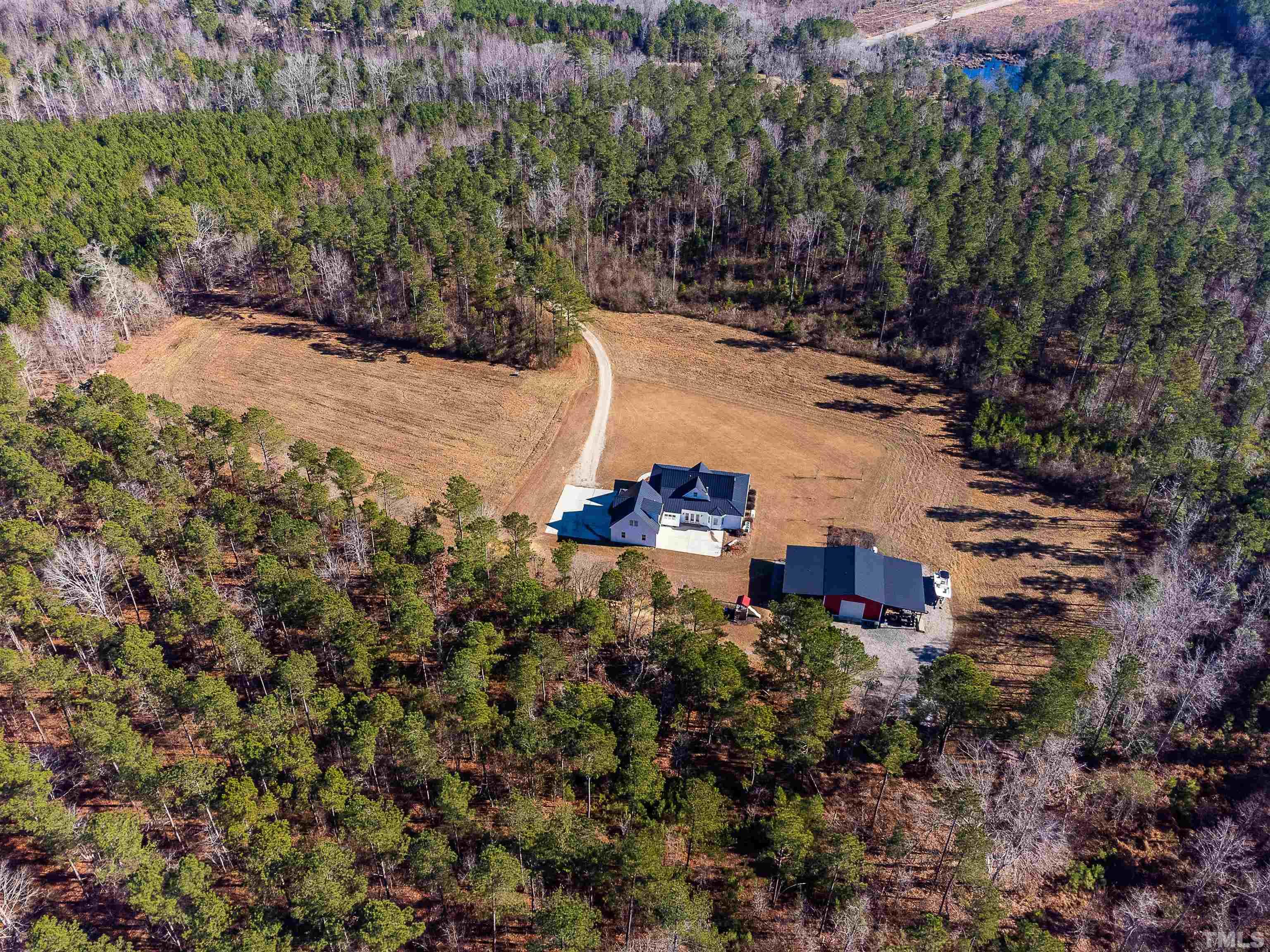 4300 Debnam Road Zebulon, NC 27597 - Photo 7 of 54 an aerial view of a house with a yard