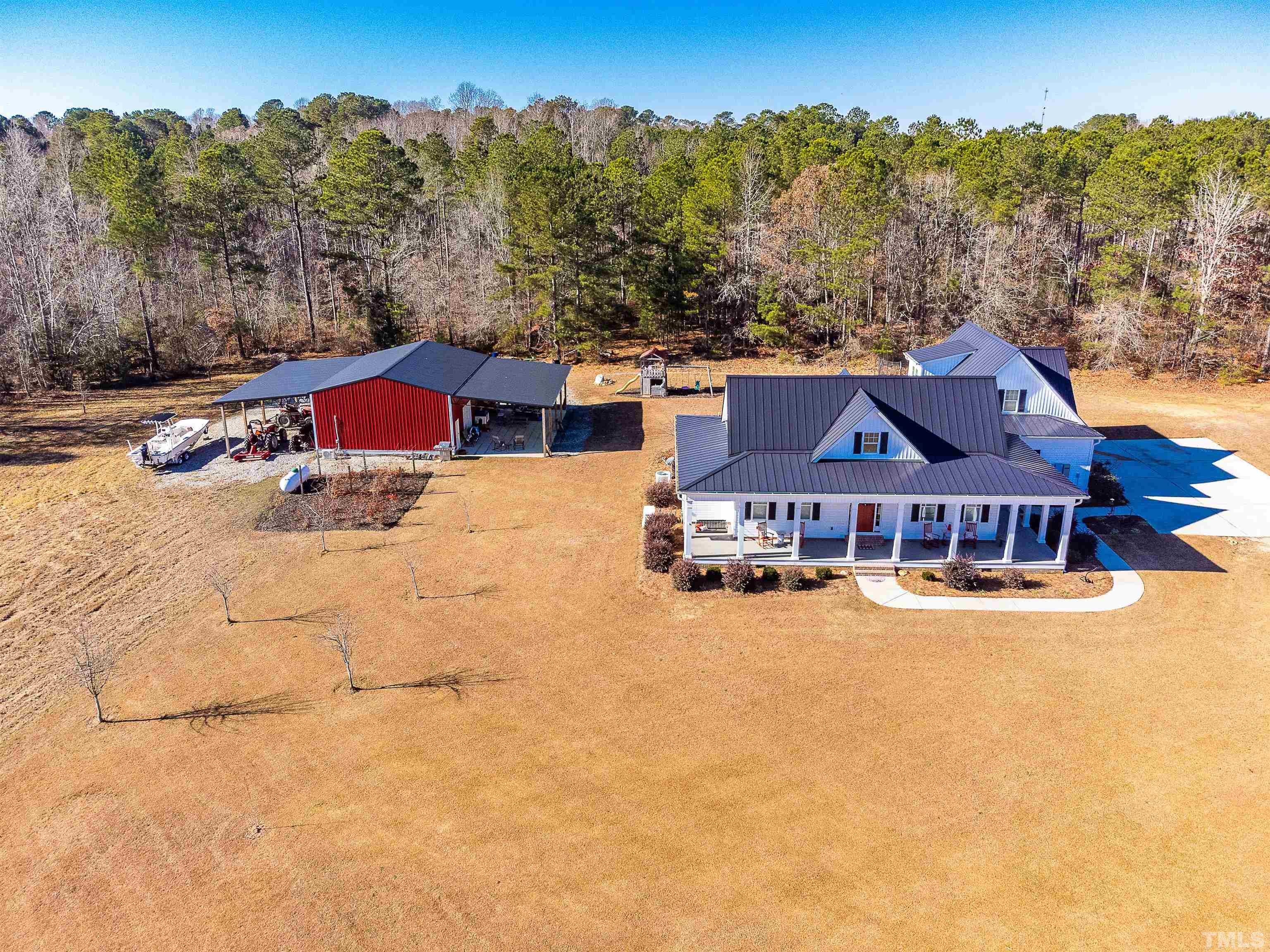 4300 Debnam Road Zebulon, NC 27597 - Photo 10 of 54 an aerial view of a house with a yard