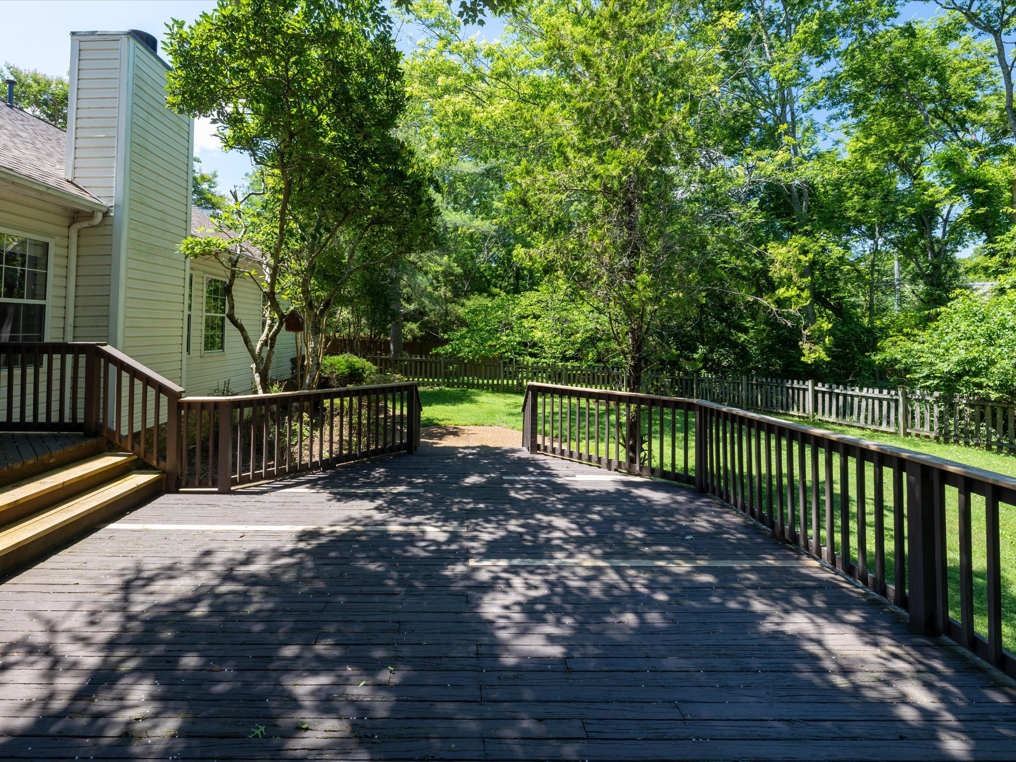 4629 Sandy Creek Road Nashville, TN 37221 - Photo 35 of 48 a view of a wooden deck with a yard