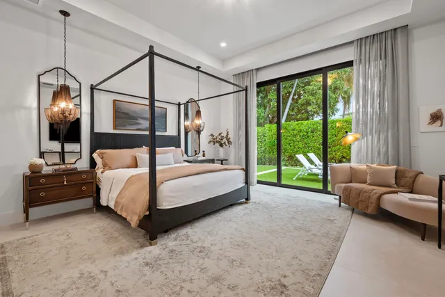 a outdoor space with patio couch and a large window