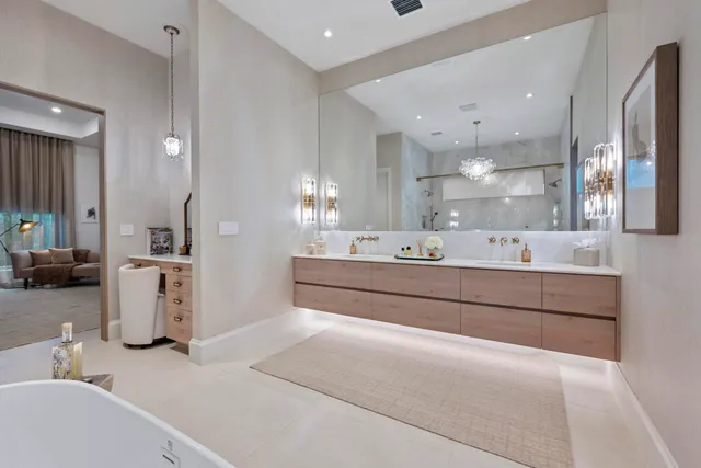 a view of a chairs and table in th patio