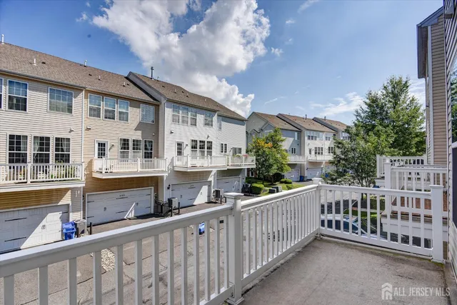 a view of a house with a small yard