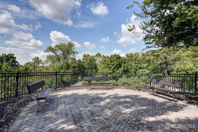 a view of outdoor space with garden and patio