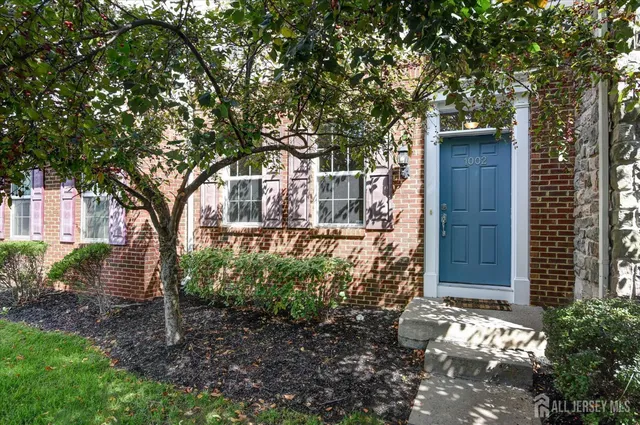 a house with trees in front of it