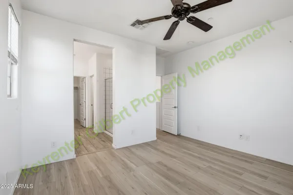 a kitchen with stainless steel appliances granite countertop a refrigerator a stove top oven a sink and dishwasher