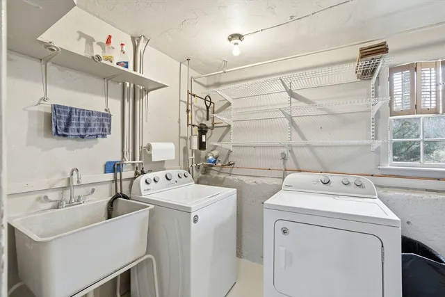 a utility room with dryer and washer