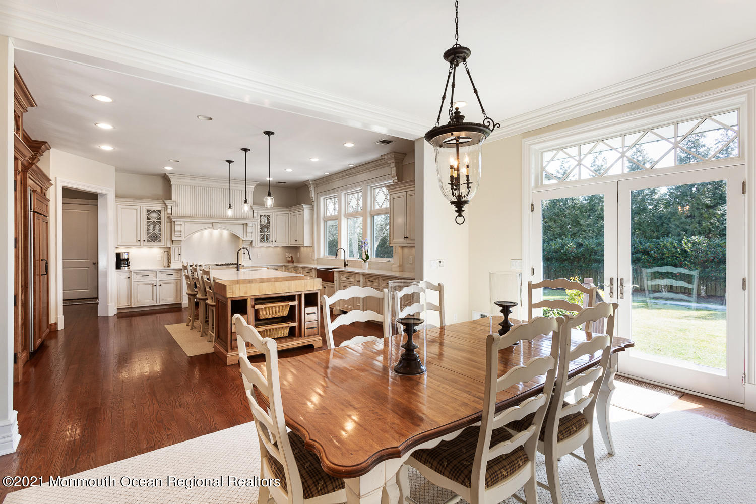 2 Harbor Drive Rumson, NJ 07760 - Photo 11 of 50 a view of a dining room and livingroom with furniture wooden floor a chandelier