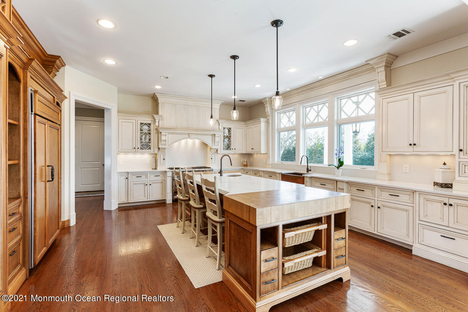 2 Harbor Drive Rumson, NJ 07760 - Photo 12 of 50 a kitchen with kitchen island a sink stove and a refrigerator