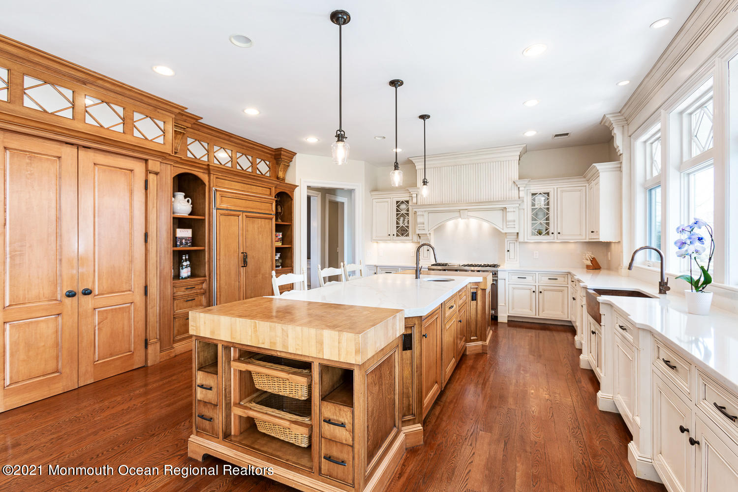 2 Harbor Drive Rumson, NJ 07760 - Photo 13 of 50 a large kitchen with kitchen island a stove a sink a refrigerator and a wooden floor