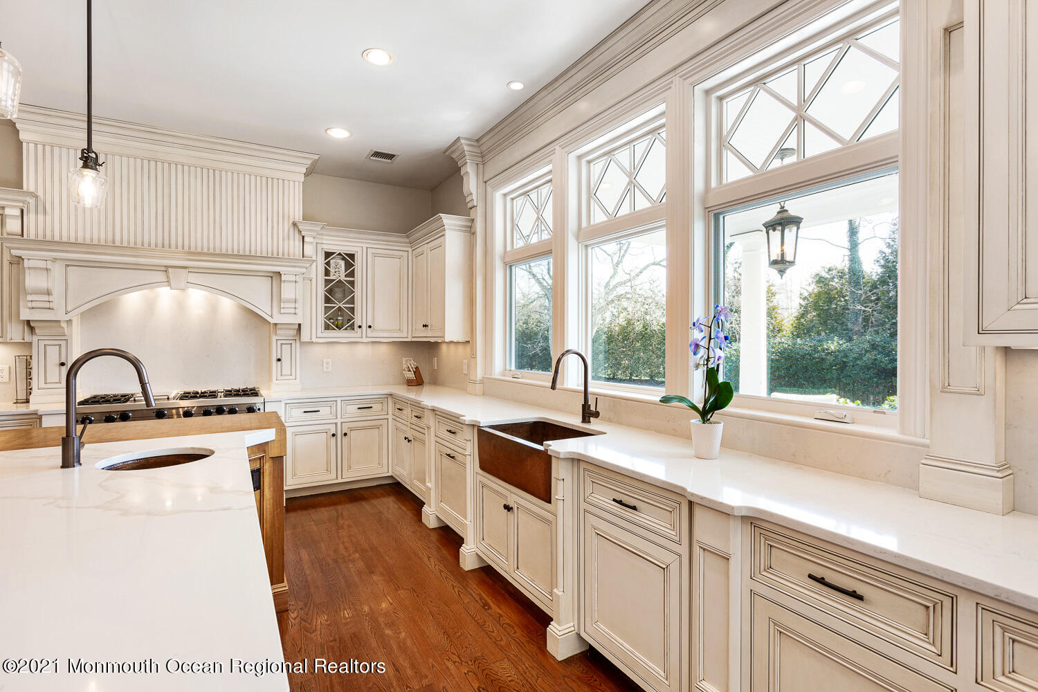 2 Harbor Drive Rumson, NJ 07760 - Photo 14 of 50 a kitchen with granite countertop a sink appliances cabinets and a large window