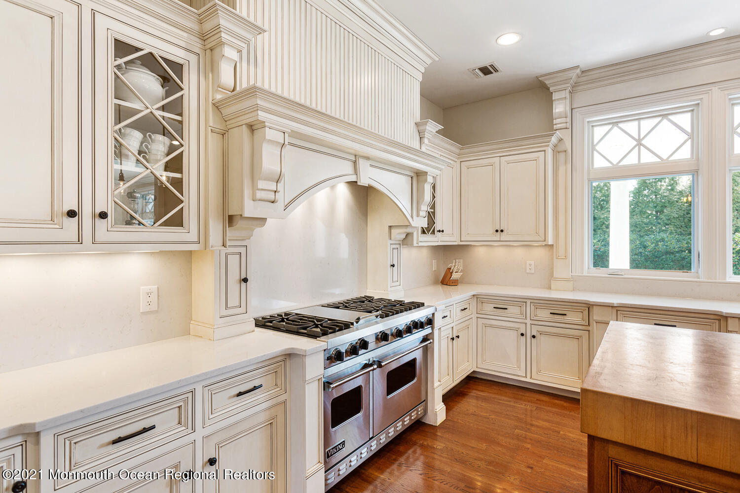 2 Harbor Drive Rumson, NJ 07760 - Photo 15 of 50 a kitchen with stainless steel appliances granite countertop a stove a sink and a window
