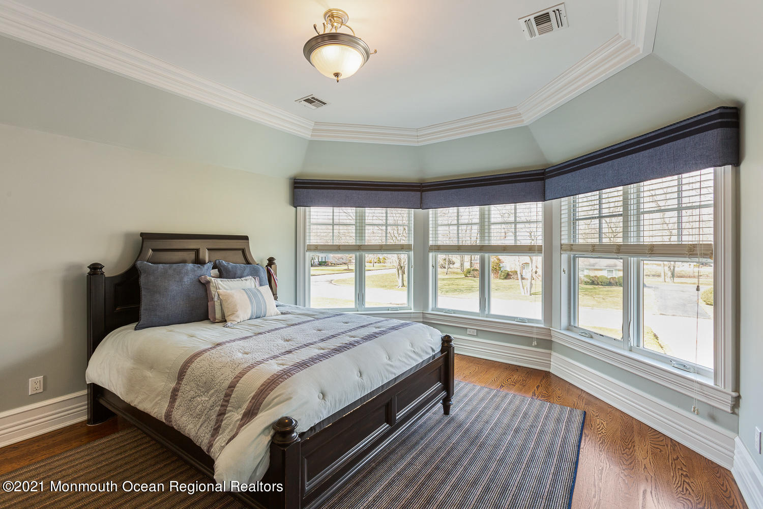 2 Harbor Drive Rumson, NJ 07760 - Photo 27 of 50 a bedroom with a large bed and a large window