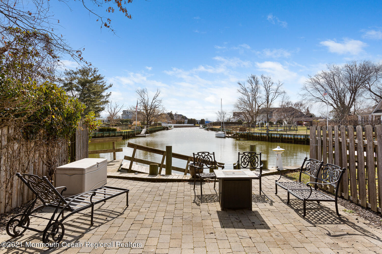 2 Harbor Drive Rumson, NJ 07760 - Photo 34 of 50 a view of a lake with table and chairs