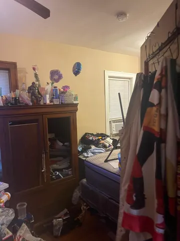 a room with furniture and a fireplace