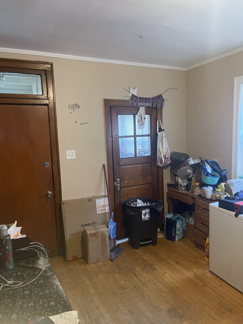 6953 South Artesian Avenue Chicago, IL 60629 - Photo 14 of 23 a room with furniture and a fireplace