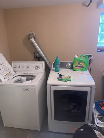 a room with furniture and a fireplace