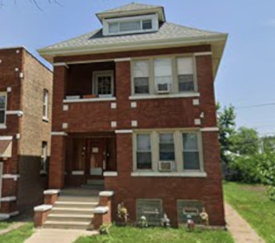 6953 South Artesian Avenue Chicago, IL 60629 - Photo 2 of 23 a front view of a house