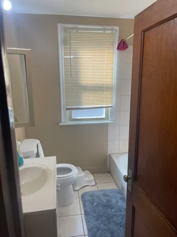 a bathroom with a toilet and a sink