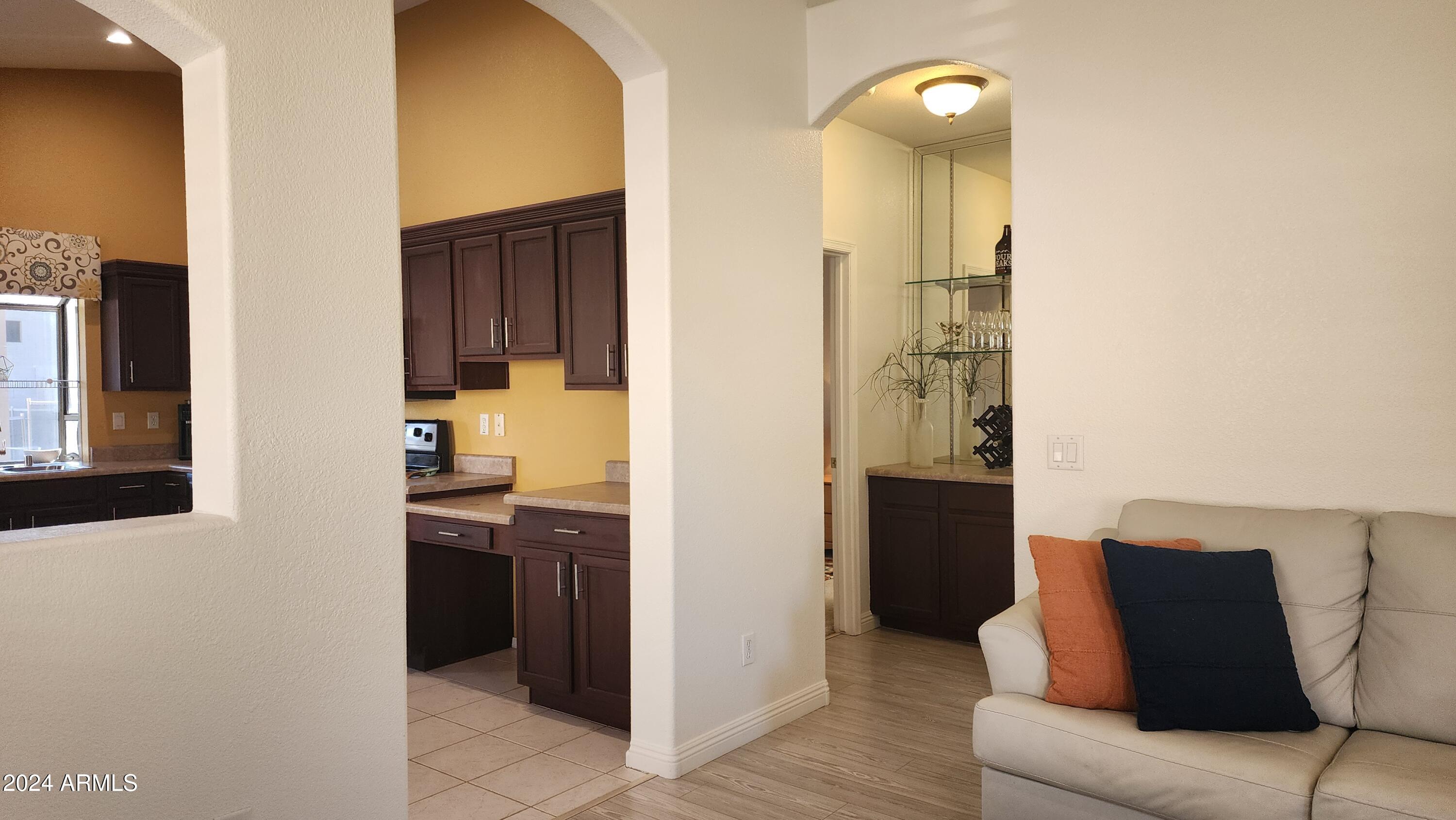 631 West Colt Road Chandler, AZ 85225 - Photo 15 of 56 Opening to Kitchen & Peek to Serving Bar