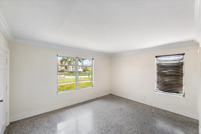 an empty room with windows