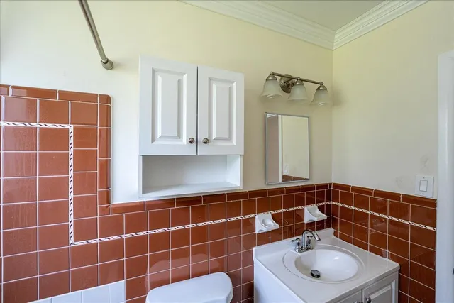 an empty room with windows and yard