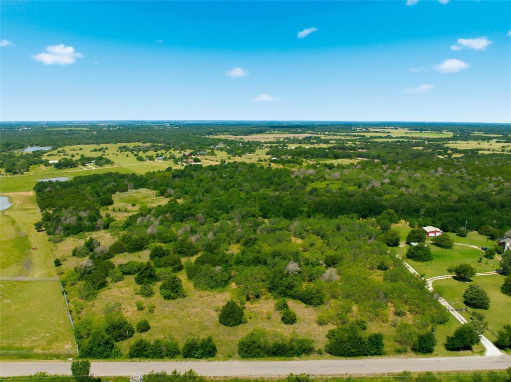 663 North Katy Road Elm Mott, TX 76640 - Photo 1 of 25 Expansive undeveloped land featuring a mix of mature trees and open clearings