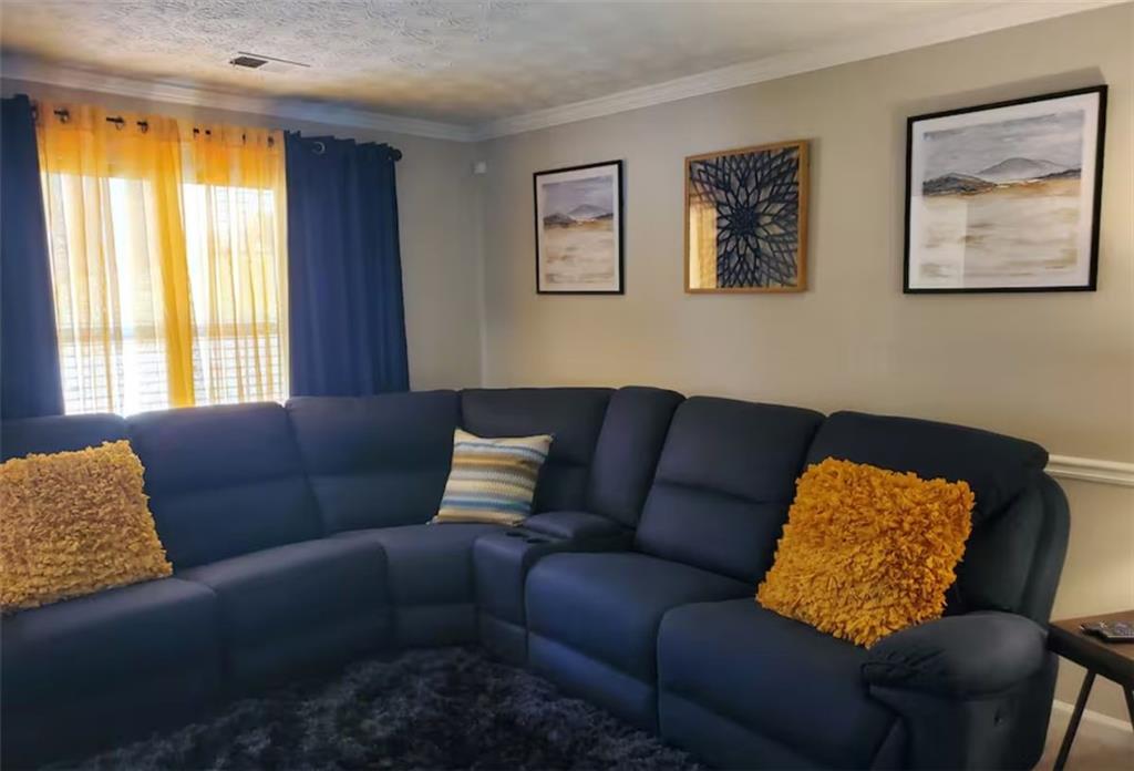 2984 Rapids Drive Decatur, GA 30034 - Photo 2 of 16 a living room with furniture and a window