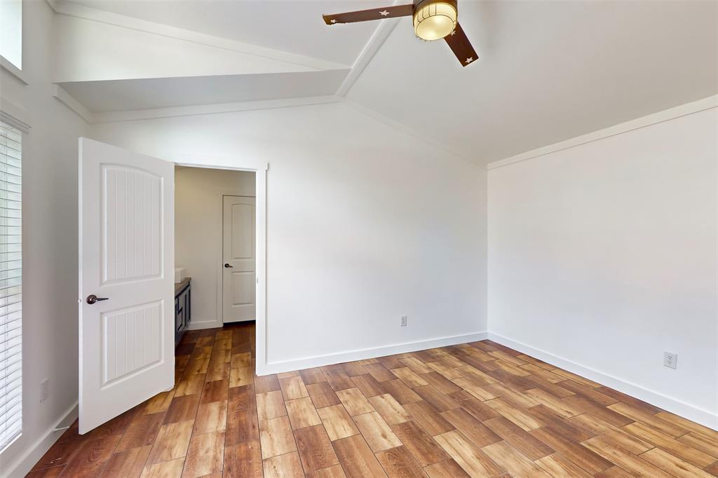 6715 Timberhaven Court Granbury, TX 76049 - Photo 18 of 40 wooden floor in an empty room