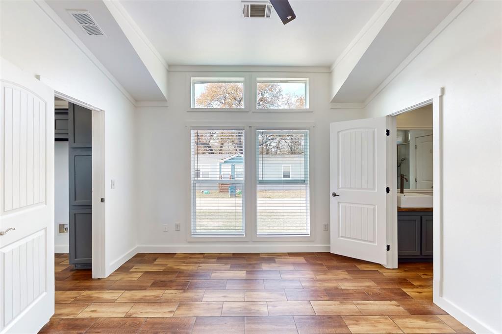 6715 Timberhaven Court Granbury, TX 76049 - Photo 19 of 40 a view of an empty room with a window