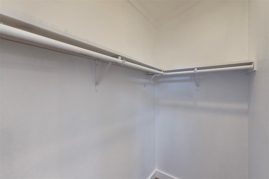 6715 Timberhaven Court Granbury, TX 76049 - Photo 23 of 40 a close up view of racks on the wall