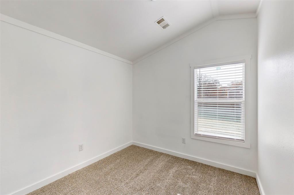 6715 Timberhaven Court Granbury, TX 76049 - Photo 30 of 40 an empty room with a window