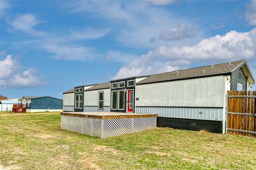 6715 Timberhaven Court Granbury, TX 76049 - Photo 3 of 40 a view of swimming pool with seating