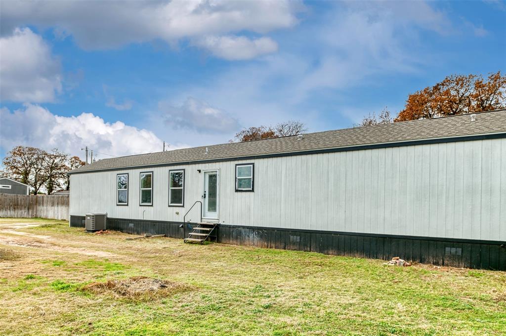 6715 Timberhaven Court Granbury, TX 76049 - Photo 36 of 40 a view of a house with swimming pool