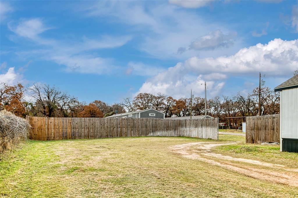 6715 Timberhaven Court Granbury, TX 76049 - Photo 38 of 40 a view of a lake